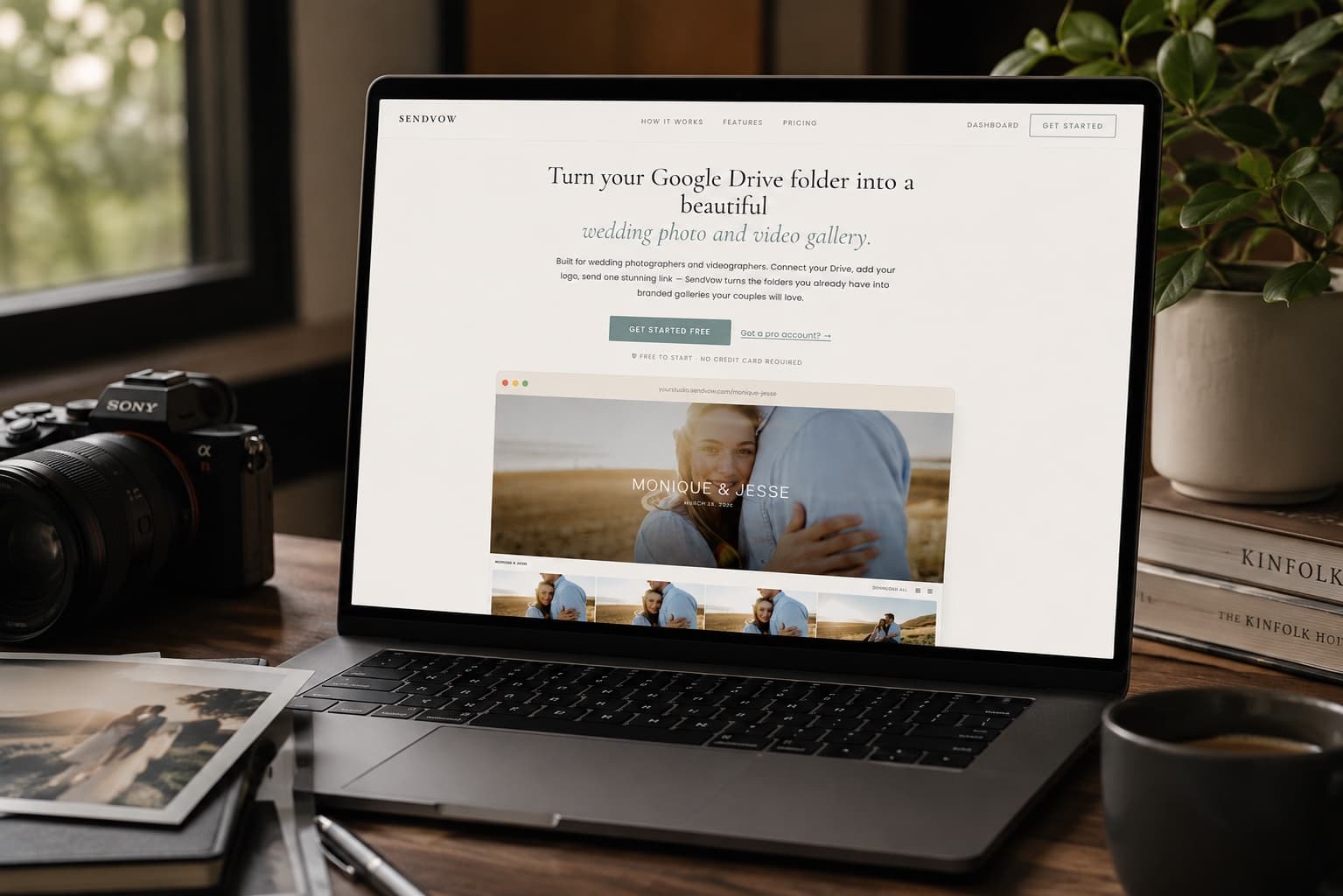 The SendVow homepage on a laptop in a photography studio, next to a camera, prints, and a coffee